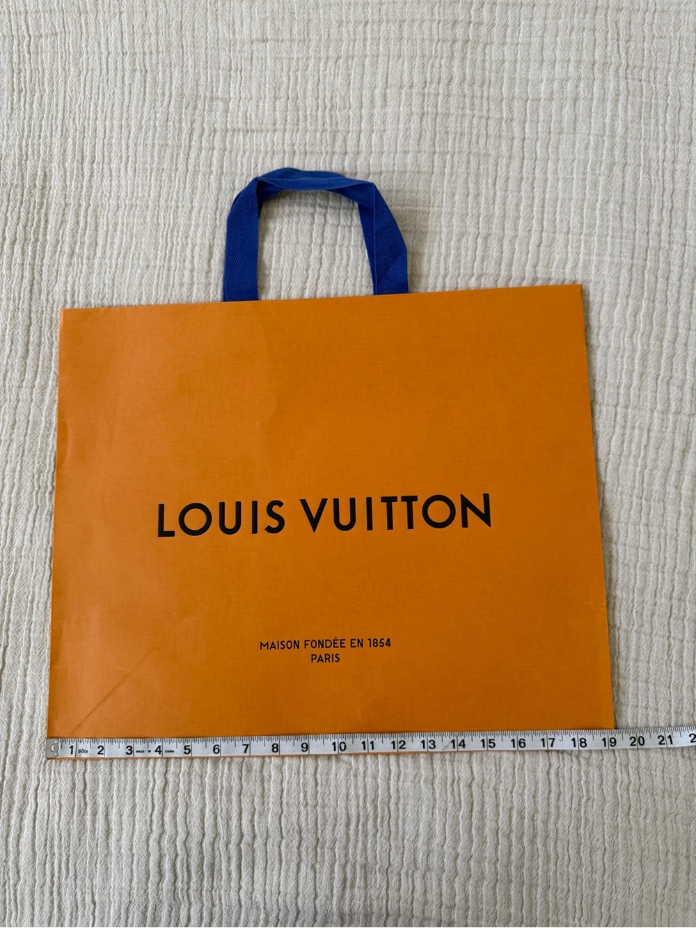 Louis Vuitton Orange Shopping Bag with Blue Handles